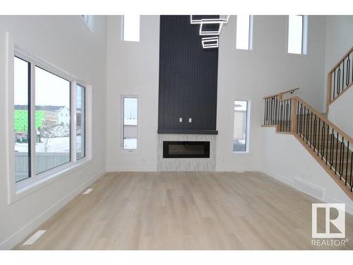 17128 2 Street, Edmonton, AB - Indoor Photo Showing Other Room With Fireplace