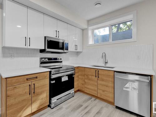 12740 130 Street, Edmonton, AB - Indoor Photo Showing Kitchen With Double Sink