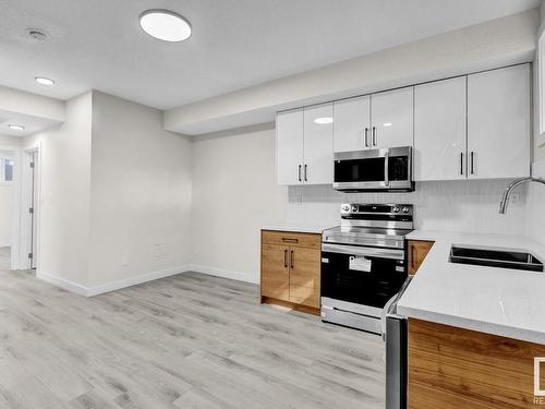 12740 130 Street, Edmonton, AB - Indoor Photo Showing Kitchen With Double Sink