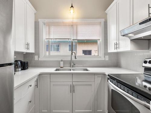 13532 78 Street, Edmonton, AB - Indoor Photo Showing Kitchen With Double Sink