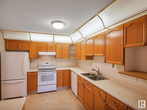 409 17519 98A Avenue, Edmonton, AB - Indoor Photo Showing Kitchen With Double Sink