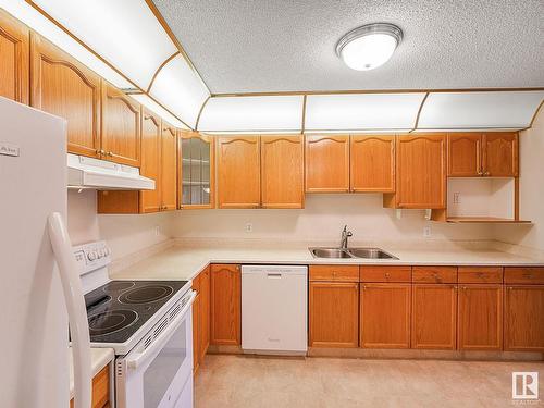 409 17519 98A Avenue, Edmonton, AB - Indoor Photo Showing Kitchen With Double Sink