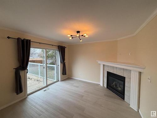 15036 135 Street, Edmonton, AB - Indoor Photo Showing Living Room With Fireplace