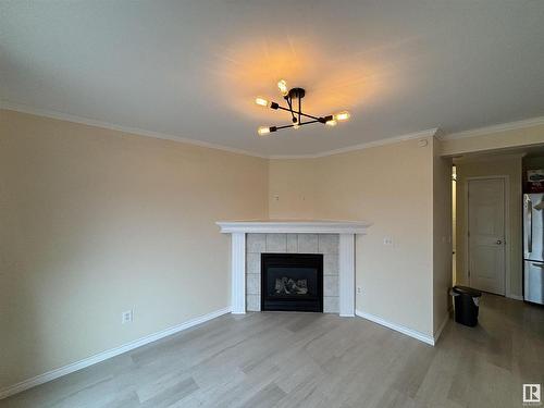 15036 135 Street, Edmonton, AB - Indoor Photo Showing Living Room With Fireplace