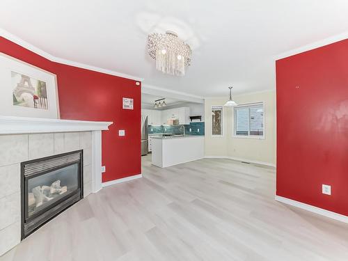 15036 135 Street, Edmonton, AB - Indoor Photo Showing Living Room With Fireplace