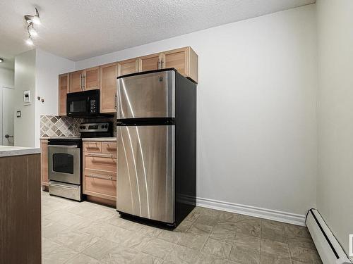 3 10515 80 Avenue, Edmonton, AB - Indoor Photo Showing Kitchen With Stainless Steel Kitchen