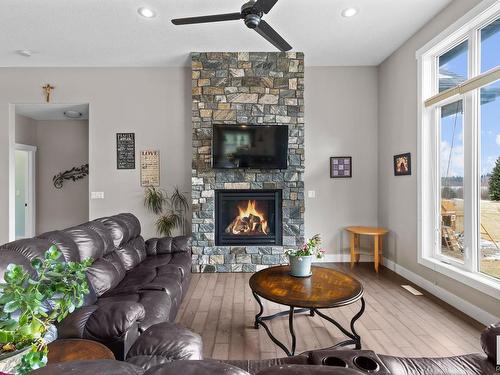 2050 Spring Lake Drive, Rural Parkland County, AB - Indoor Photo Showing Living Room With Fireplace