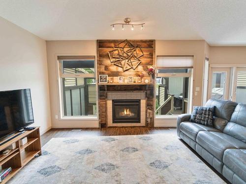 21108 92B Avenue Nw, Edmonton, AB - Indoor Photo Showing Living Room With Fireplace