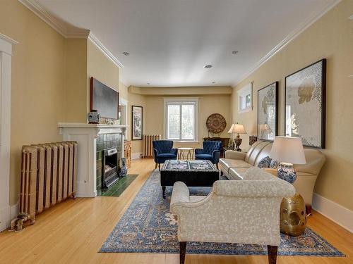 10347 Villa Avenue, Edmonton, AB - Indoor Photo Showing Living Room With Fireplace