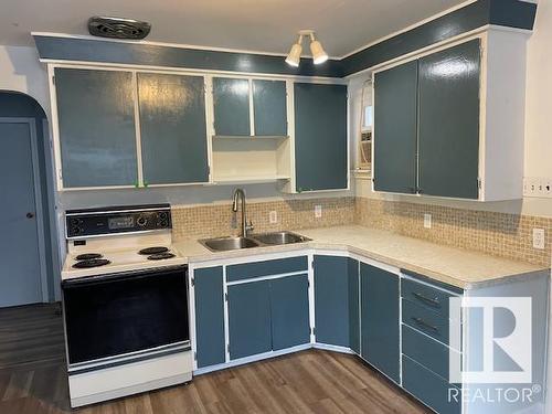 12005 45 Street Nw, Edmonton, AB - Indoor Photo Showing Kitchen With Double Sink