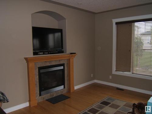 26 Whitetail Crescent, Mundare, AB - Indoor Photo Showing Other Room With Fireplace