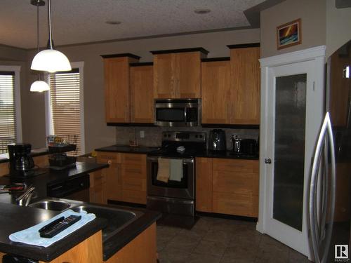 26 Whitetail Crescent, Mundare, AB - Indoor Photo Showing Kitchen With Double Sink