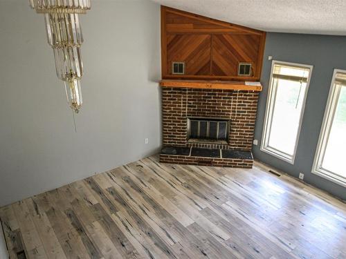 St. Paul Town, AB - Indoor Photo Showing Living Room With Fireplace