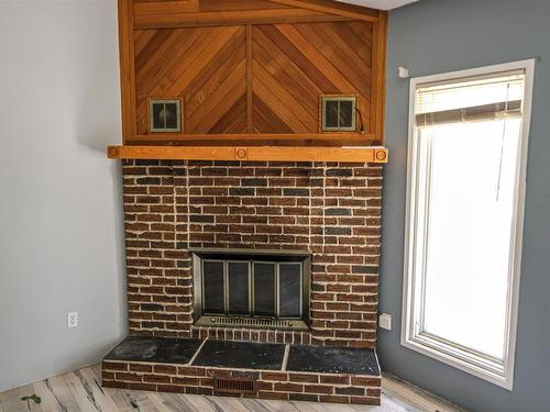 St. Paul Town, AB - Indoor Photo Showing Other Room With Fireplace