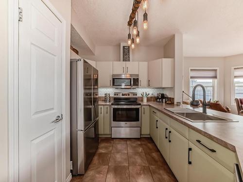 205 9927 79 Avenue, Edmonton, AB - Indoor Photo Showing Kitchen With Stainless Steel Kitchen