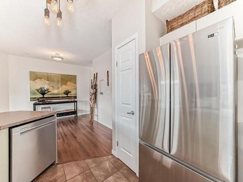 205 9927 79 Avenue, Edmonton, AB - Indoor Photo Showing Kitchen With Stainless Steel Kitchen