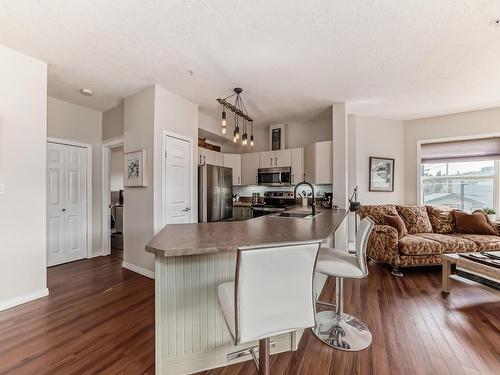 205 9927 79 Avenue, Edmonton, AB - Indoor Photo Showing Living Room