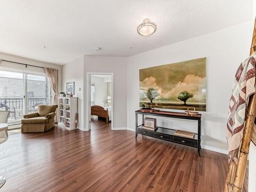 205 9927 79 Avenue, Edmonton, AB - Indoor Photo Showing Living Room