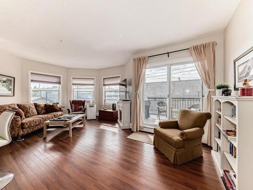 205 9927 79 Avenue, Edmonton, AB - Indoor Photo Showing Living Room