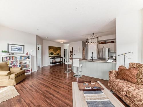 205 9927 79 Avenue, Edmonton, AB - Indoor Photo Showing Living Room