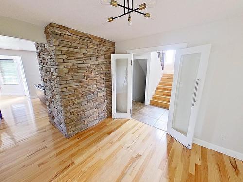 4903 58 Street, Barrhead, AB - Indoor Photo Showing Other Room With Fireplace