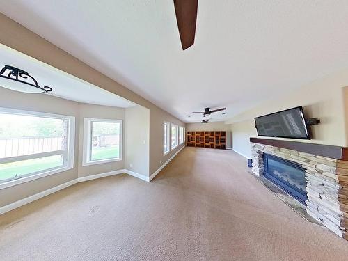 4903 58 Street, Barrhead, AB - Indoor Photo Showing Other Room With Fireplace