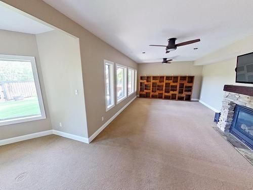 4903 58 Street, Barrhead, AB - Indoor Photo Showing Other Room With Fireplace