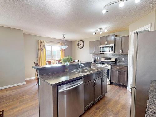 1651 28 Street, Edmonton, AB - Indoor Photo Showing Kitchen With Double Sink