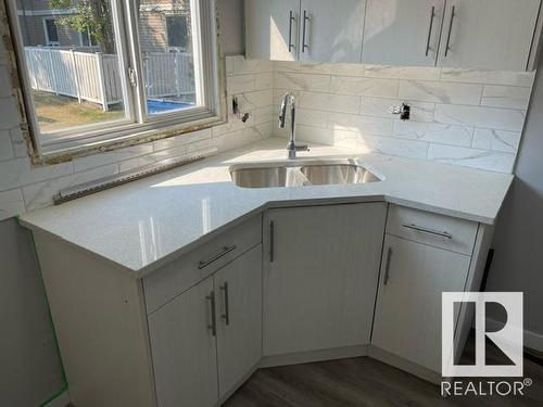 7925 27 Ave Nw, Edmonton, AB - Indoor Photo Showing Kitchen With Double Sink