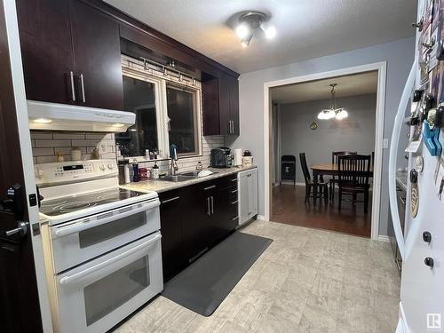 5310 52 Avenue, Elk Point, AB - Indoor Photo Showing Kitchen With Double Sink