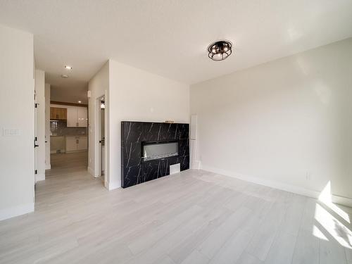 17918 70A Street, Edmonton, AB - Indoor Photo Showing Other Room With Fireplace