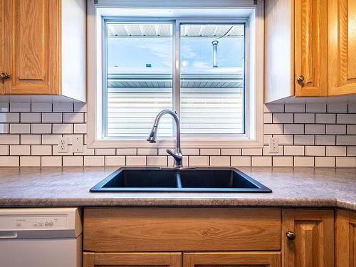 A 4301 48 Street, Leduc, AB - Indoor Photo Showing Kitchen With Double Sink