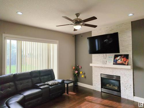 16719 54 Street, Edmonton, AB - Indoor Photo Showing Living Room With Fireplace