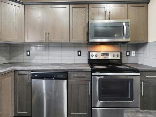 2907 15 Street, Edmonton, AB - Indoor Photo Showing Kitchen With Stainless Steel Kitchen