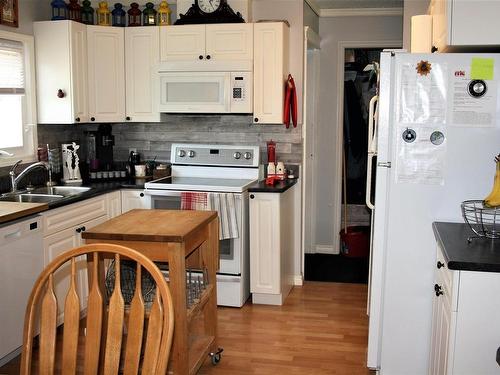 10340 108 Ave, Westlock, AB - Indoor Photo Showing Kitchen With Double Sink