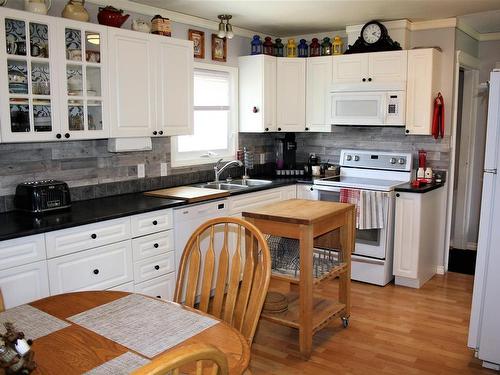 10340 108 Ave, Westlock, AB - Indoor Photo Showing Kitchen With Double Sink