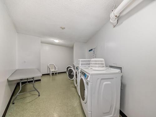 215 13910 Stony Plain Road, Edmonton, AB - Indoor Photo Showing Laundry Room