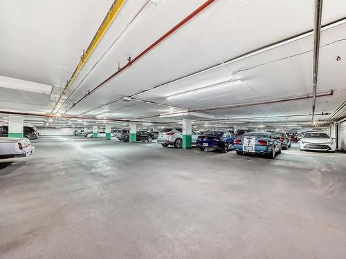 215 13910 Stony Plain Road, Edmonton, AB - Indoor Photo Showing Garage