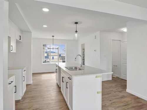 81 50 Mclaughlin Drive, Spruce Grove, AB - Indoor Photo Showing Kitchen With Double Sink