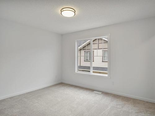 81 50 Mclaughlin Drive, Spruce Grove, AB - Indoor Photo Showing Other Room