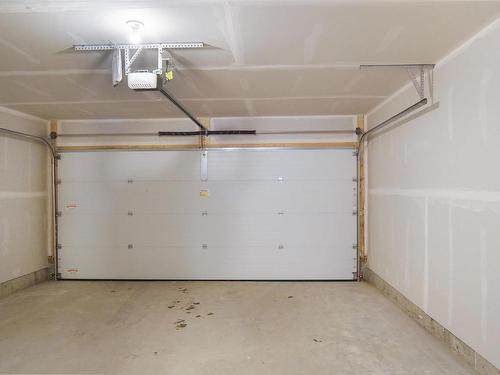 81 50 Mclaughlin Drive, Spruce Grove, AB - Indoor Photo Showing Garage