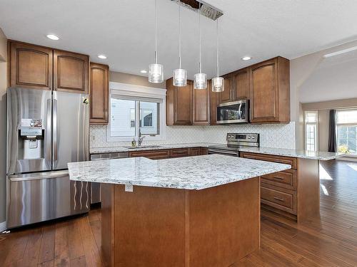 108 Ravine Villa(S), Leduc, AB - Indoor Photo Showing Kitchen With Upgraded Kitchen