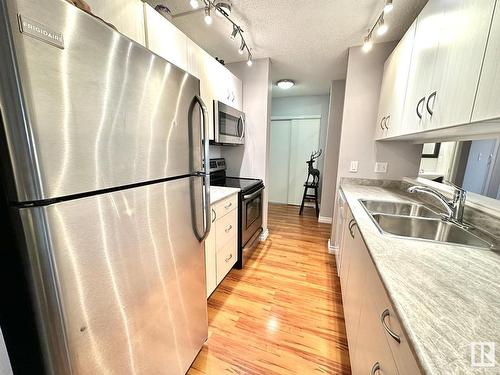 111 11620 9A Avenue, Edmonton, AB - Indoor Photo Showing Kitchen With Stainless Steel Kitchen With Double Sink With Upgraded Kitchen