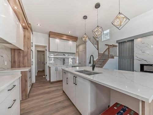 28 Ashbury Crescent, Spruce Grove, AB - Indoor Photo Showing Kitchen With Double Sink