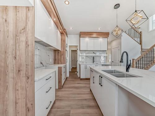 28 Ashbury Crescent, Spruce Grove, AB - Indoor Photo Showing Kitchen With Double Sink