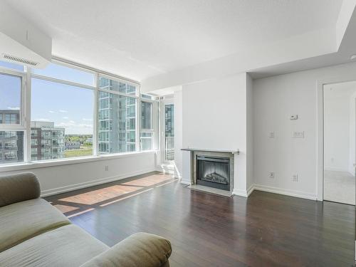 709 2612 109 Street, Edmonton, AB - Indoor Photo Showing Living Room With Fireplace