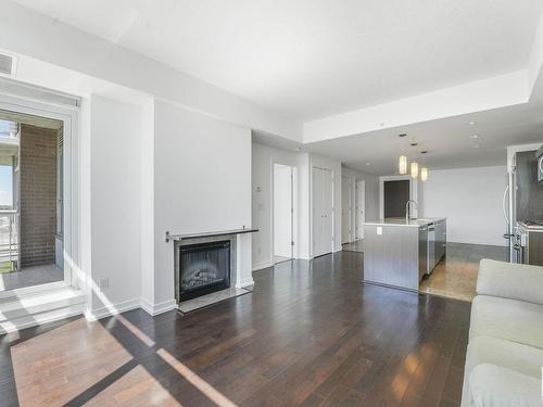 709 2612 109 Street, Edmonton, AB - Indoor Photo Showing Living Room With Fireplace