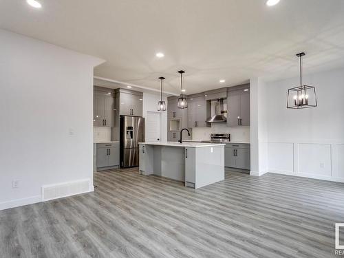 31 Caledon Crescent, Spruce Grove, AB - Indoor Photo Showing Kitchen With Stainless Steel Kitchen With Upgraded Kitchen