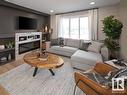 25 29 Airport Road, Edmonton, AB  - Indoor Photo Showing Living Room With Fireplace 