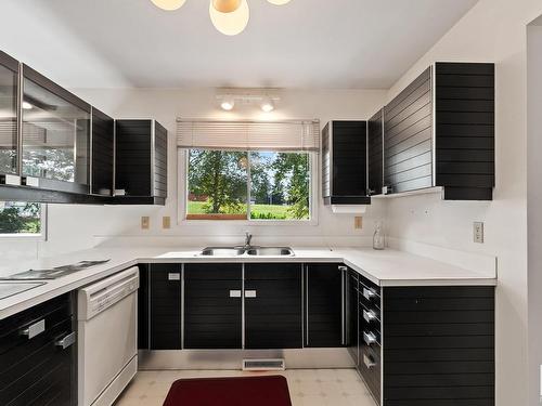 4413 53A Avenue, Smoky Lake Town, AB - Indoor Photo Showing Kitchen With Double Sink